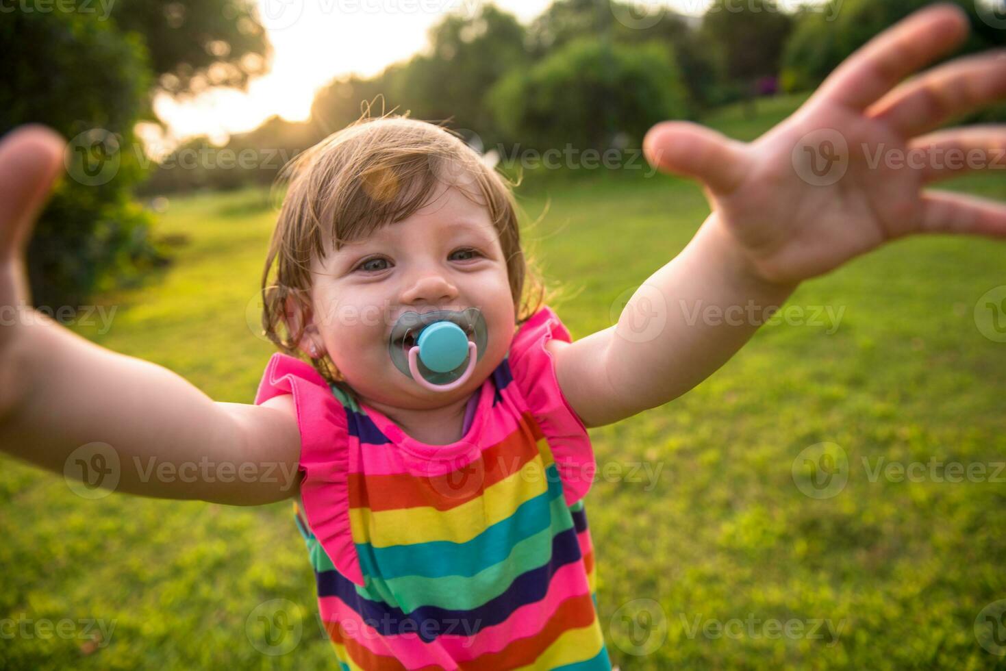 little girl spending time at backyard photo