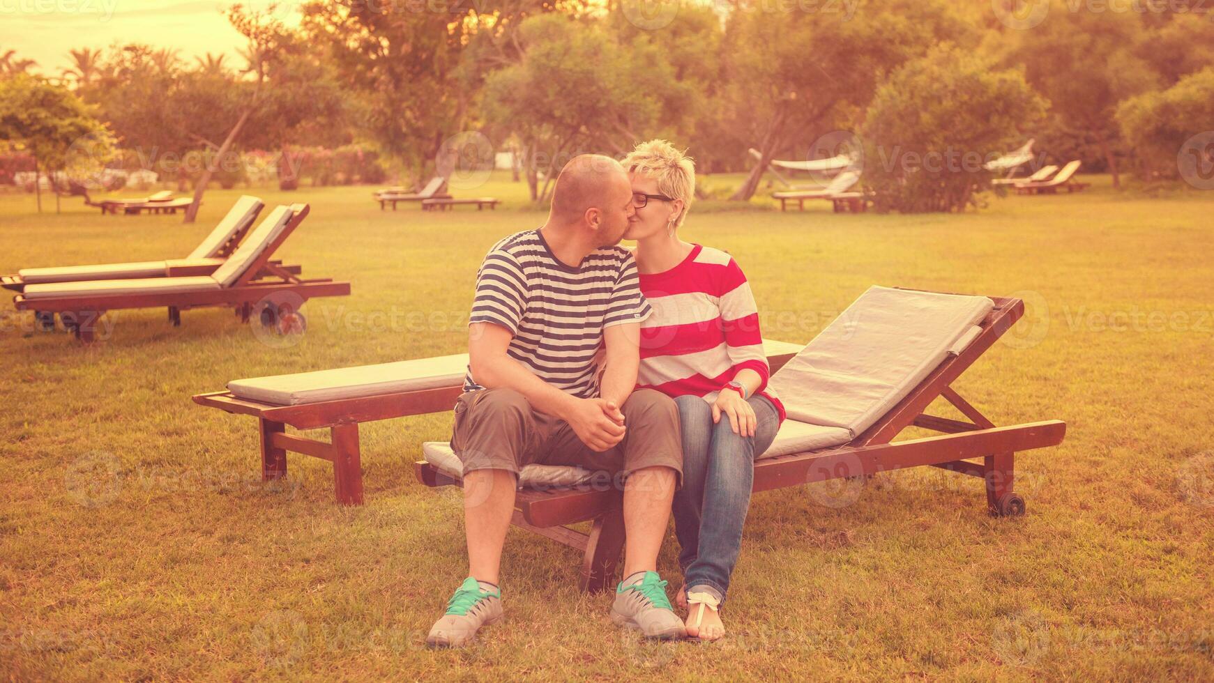young couple enjoying vacation photo