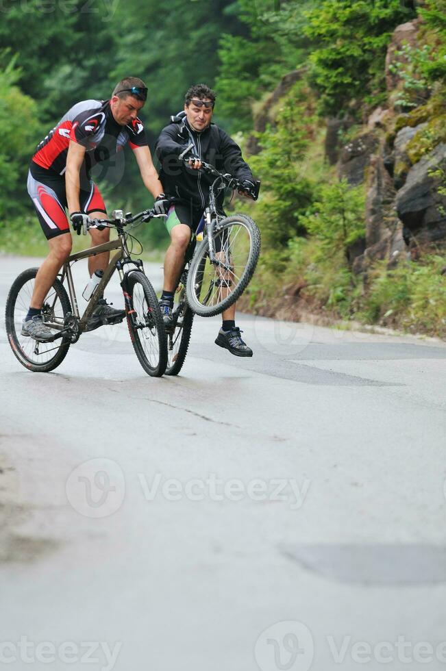 friendshiop outdoor on mountain bike photo