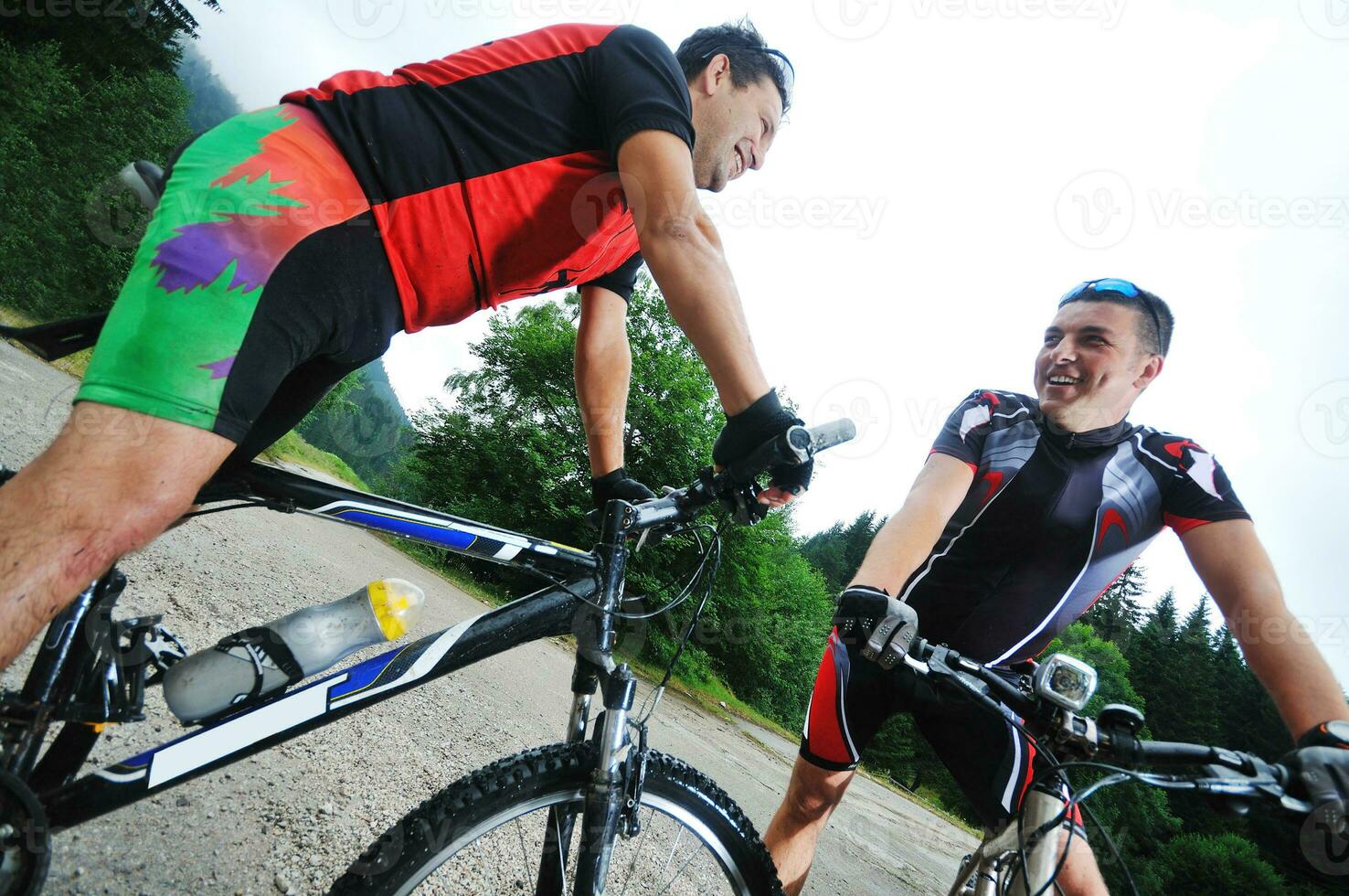 friendship and travel on mountain bike photo