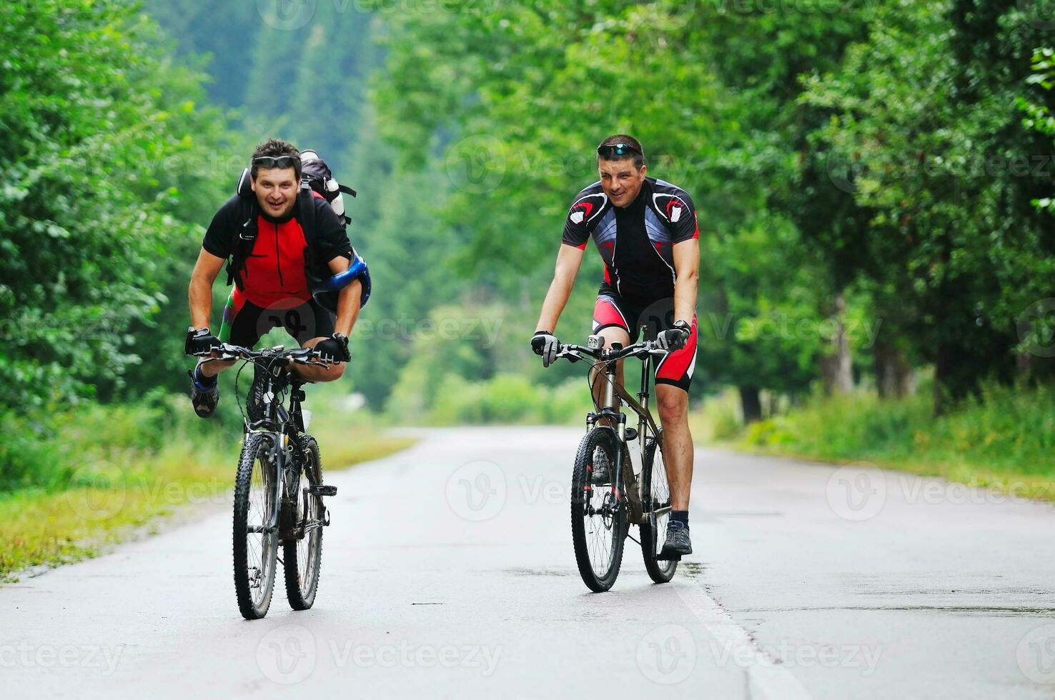friendship and travel on mountain bike photo