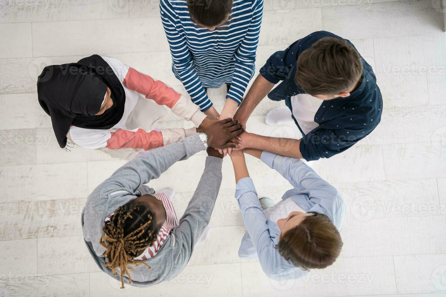 Top view of a diverse group of people symbolizing togetherness photo