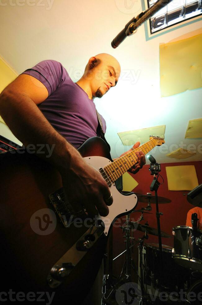 music band have training in garage photo