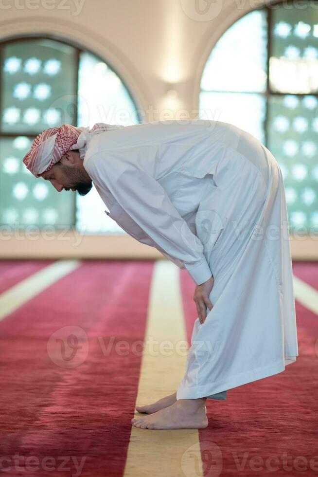 muslim prayer inside the mosque photo