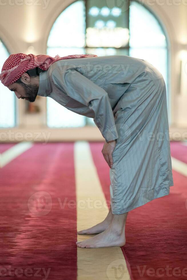 muslim prayer inside the mosque photo
