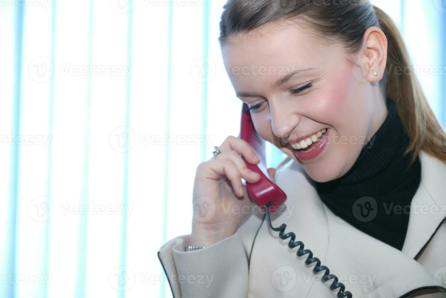 .businesswoman talking by phone photo