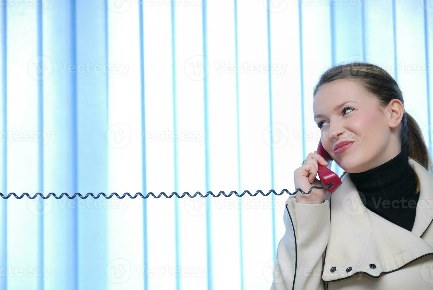 .businesswoman talking by phone photo