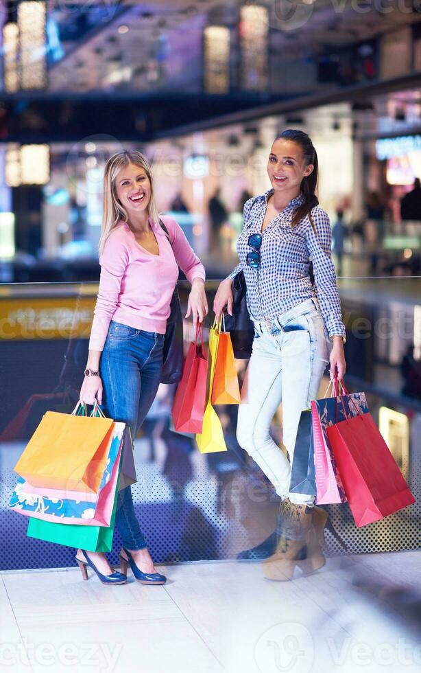 happy young girls in  shopping mall photo