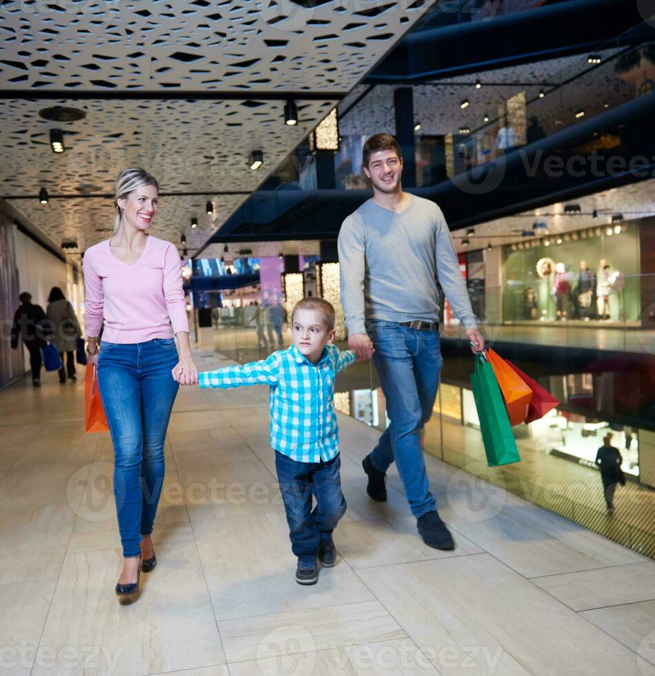 young family with shopping bags photo