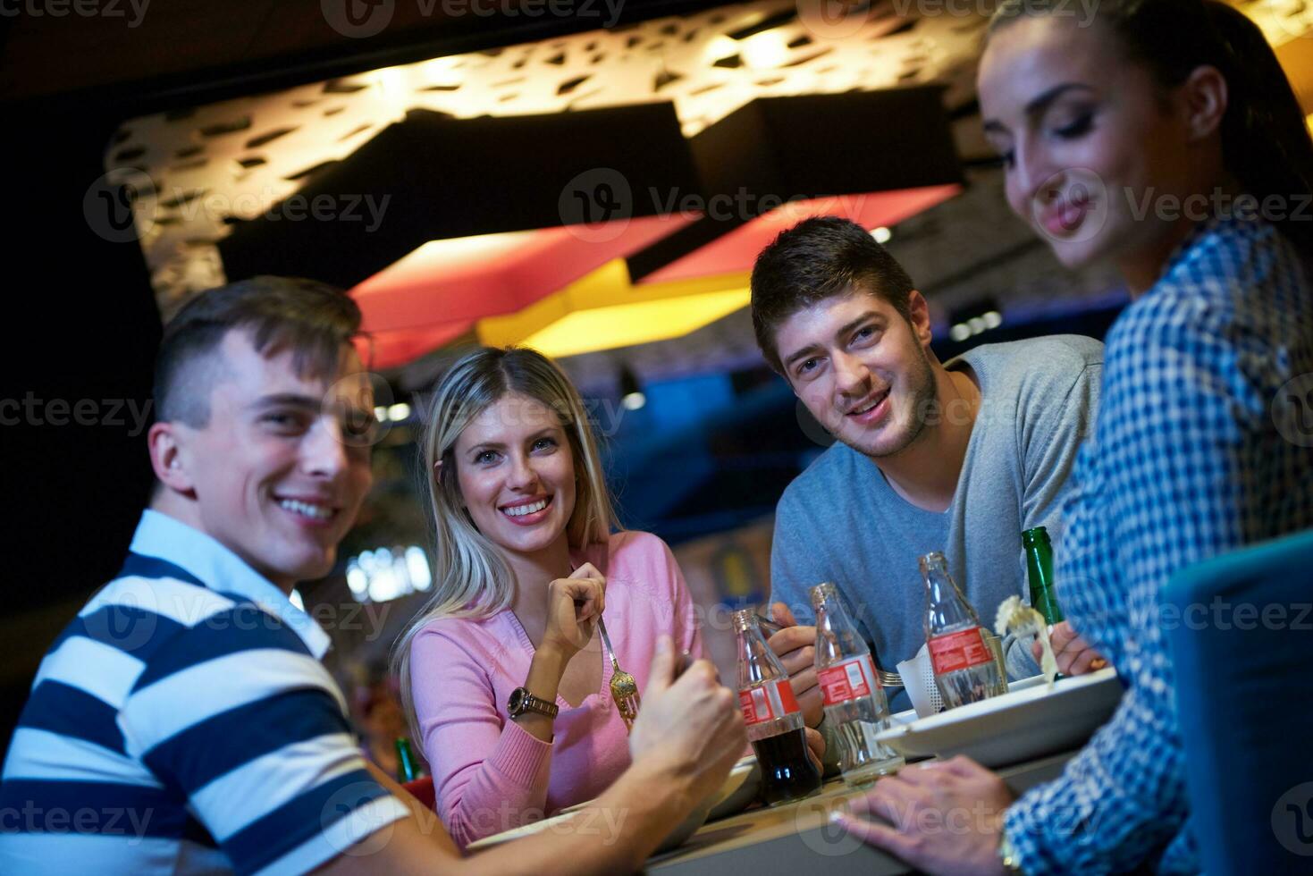 friends have lanch break in shopping mall photo