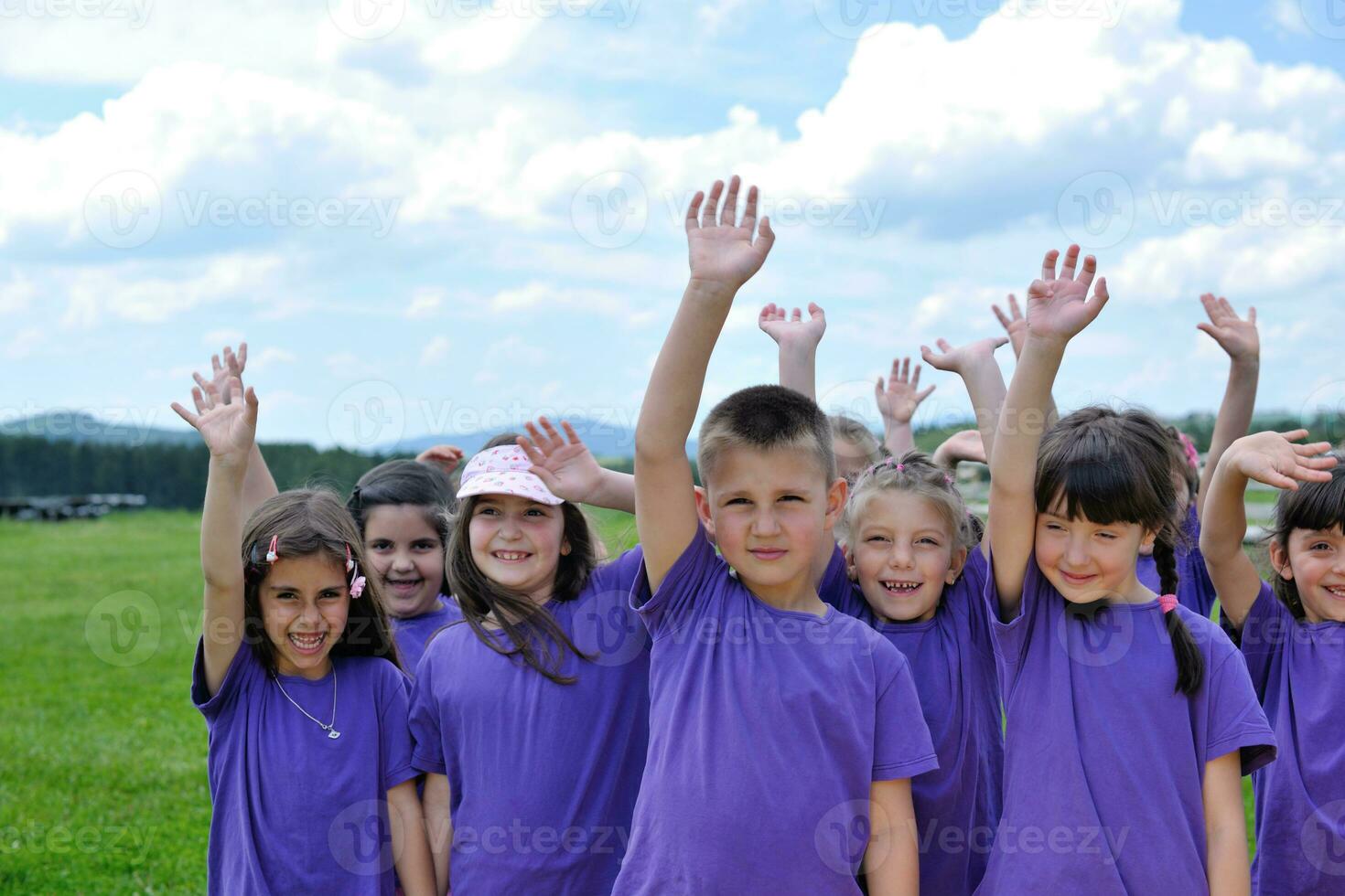 happy kids group  have fun in nature photo