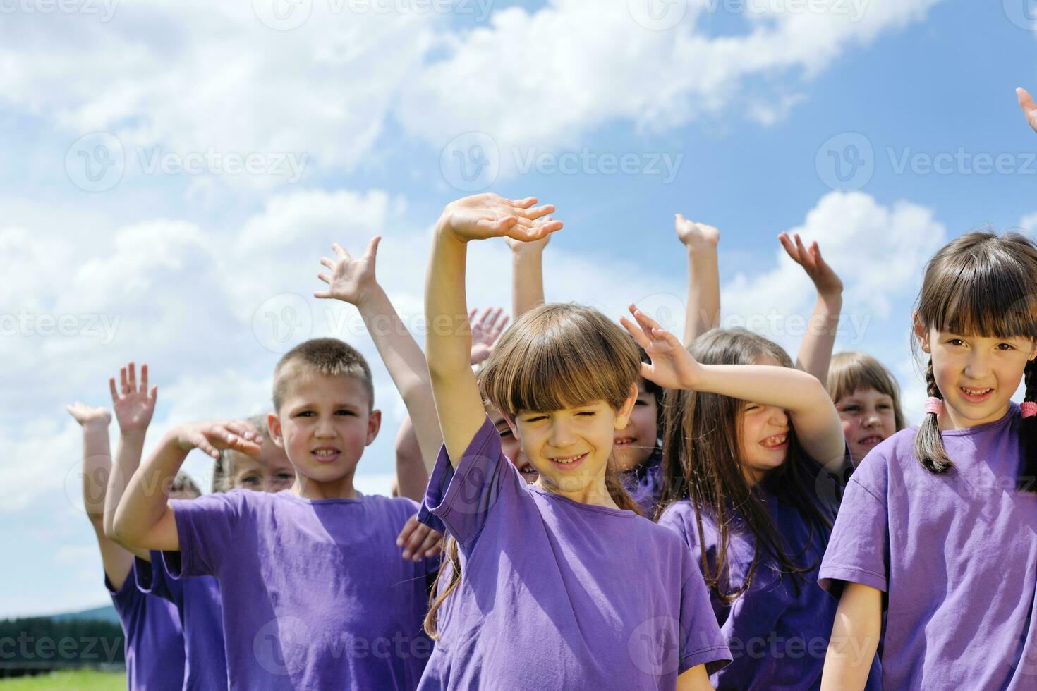 happy kids group  have fun in nature photo