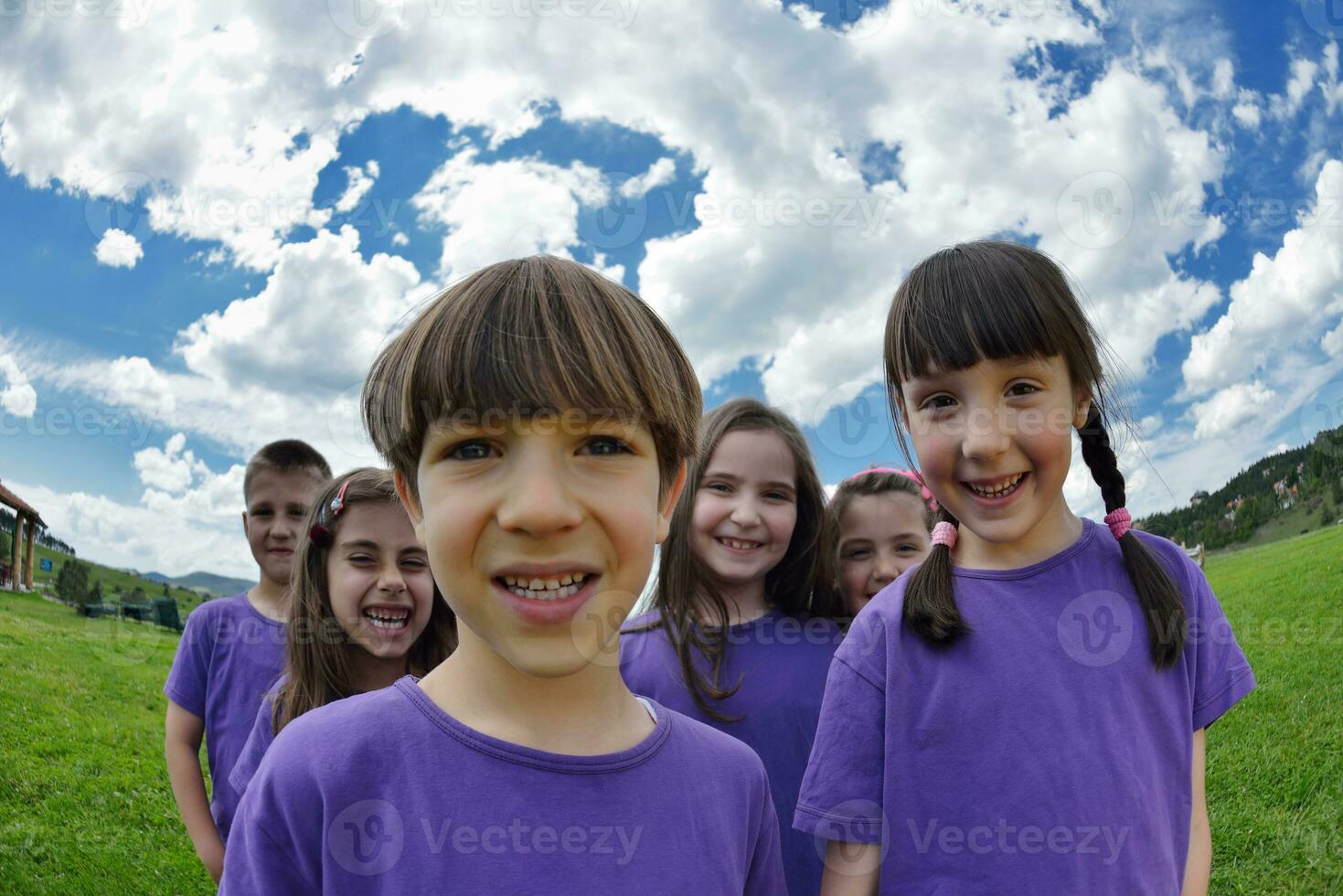 happy kids group  have fun in nature photo