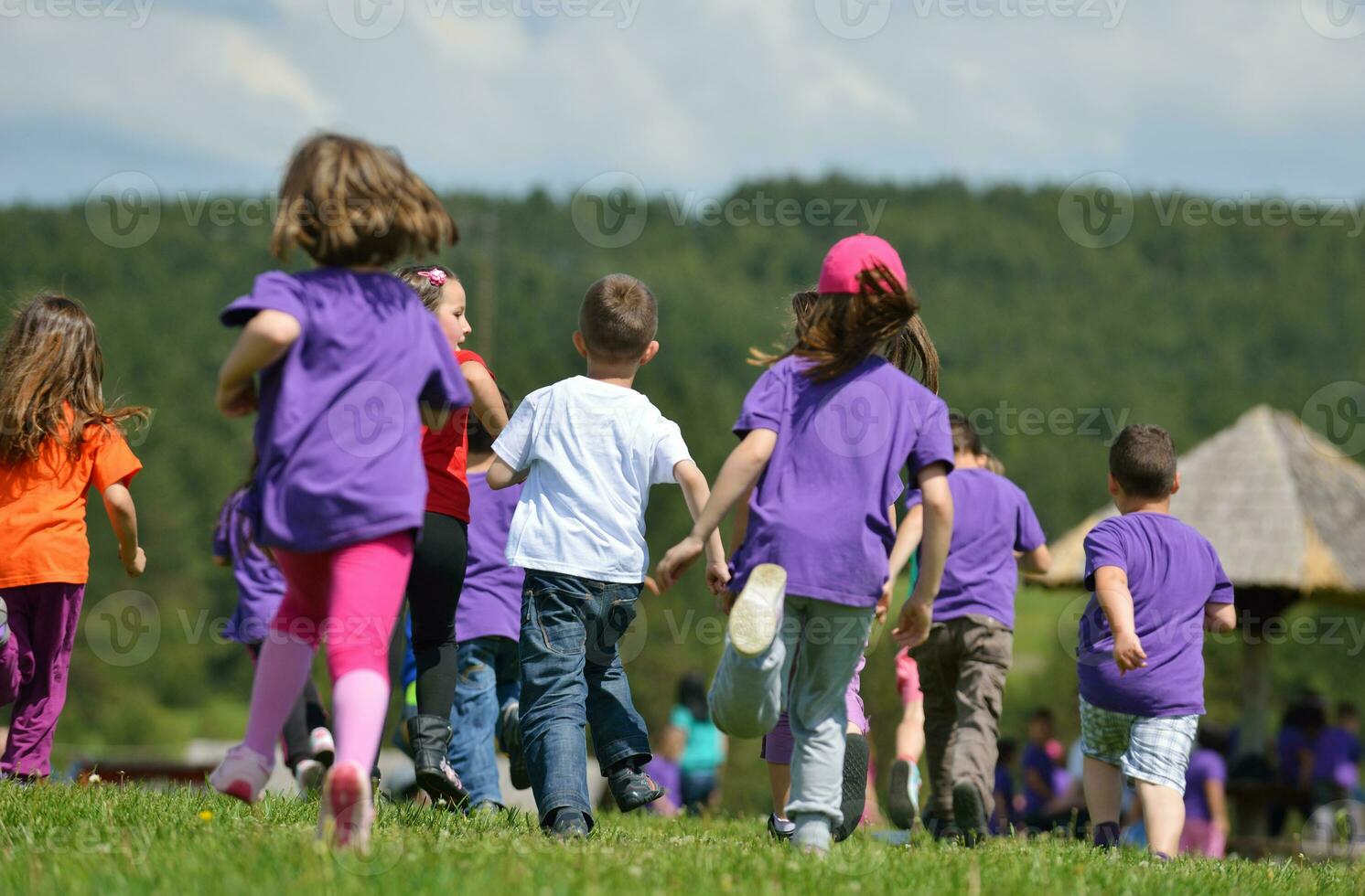 happy kids group  have fun in nature photo