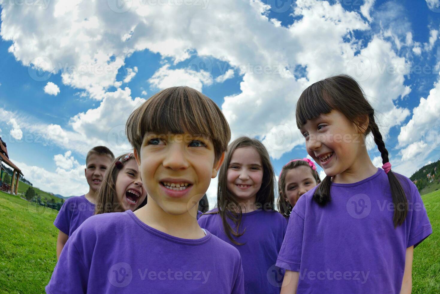 happy kids group  have fun in nature photo