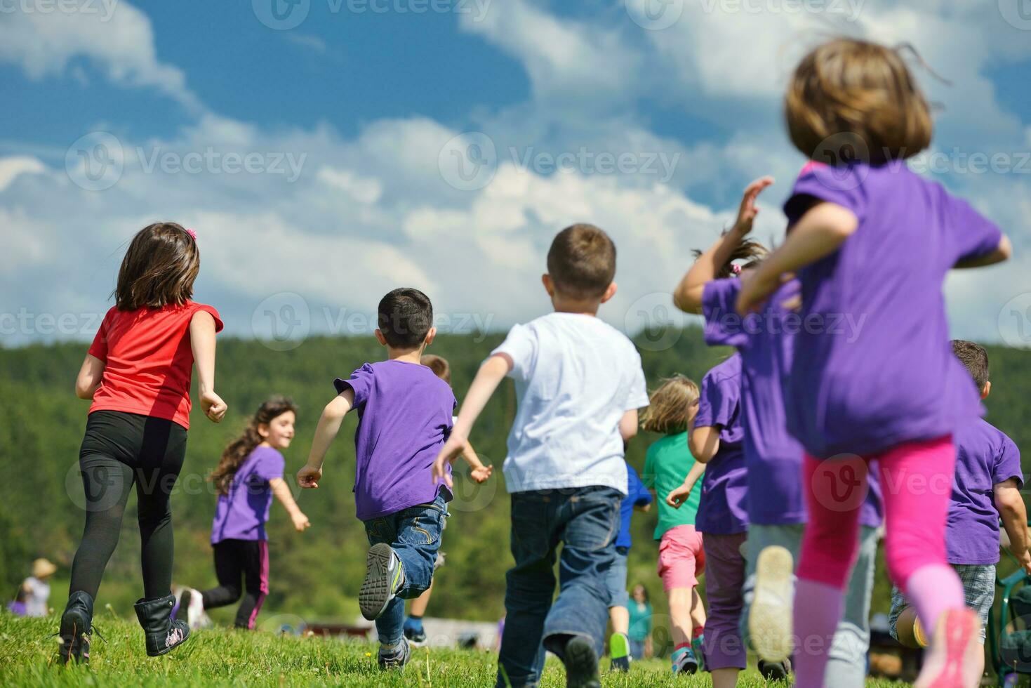 happy kids group  have fun in nature photo