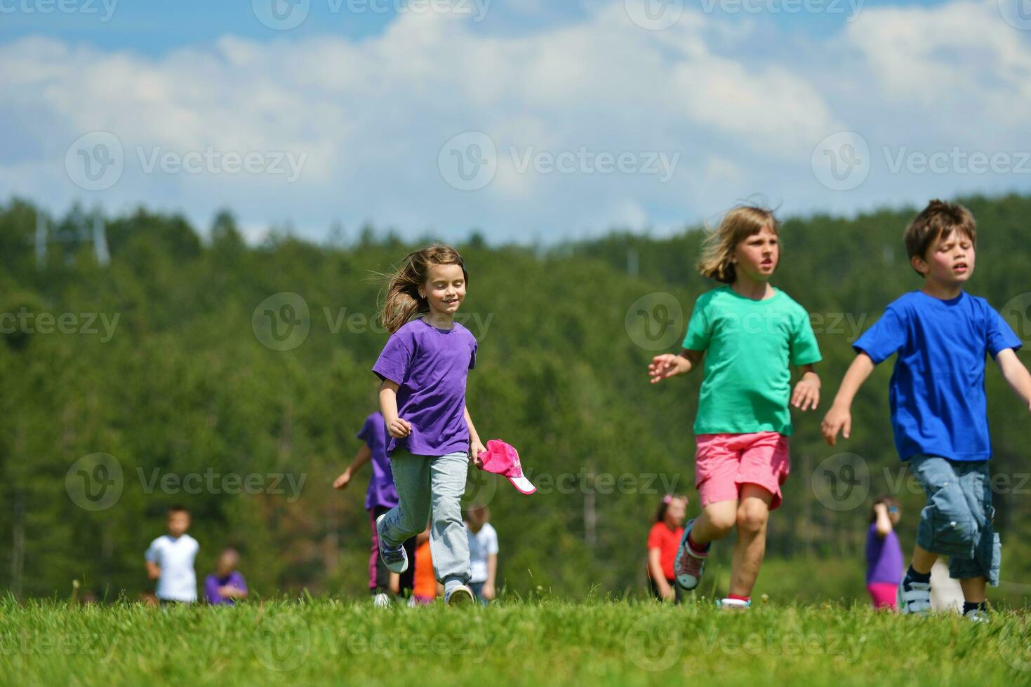 happy kids group  have fun in nature photo