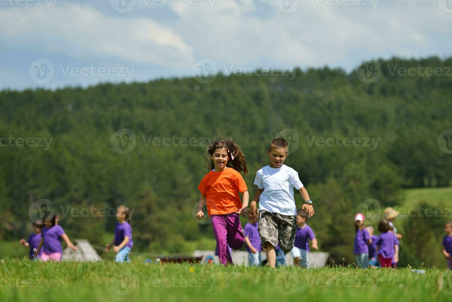 happy kids group  have fun in nature photo