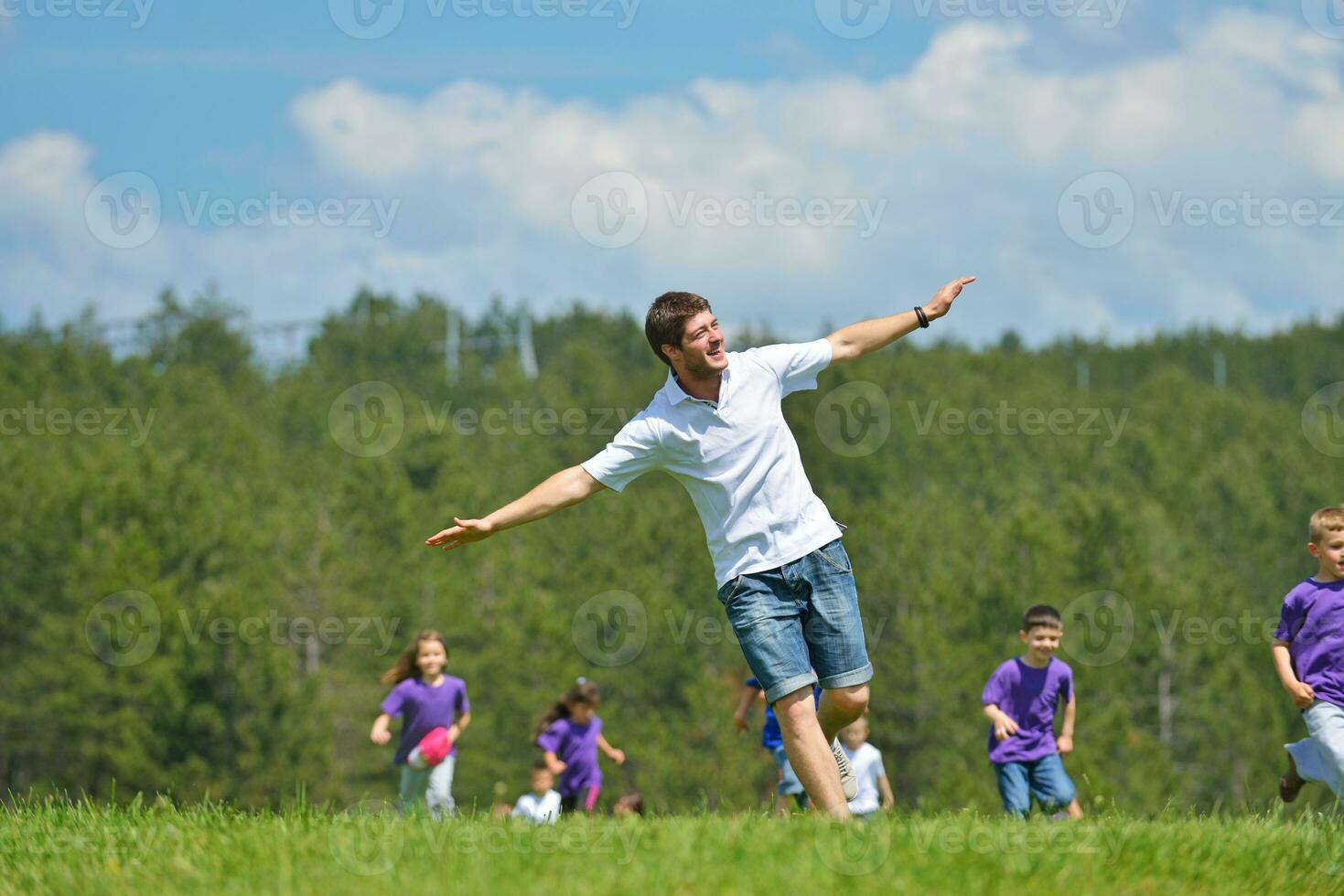 happy kids group  have fun in nature photo