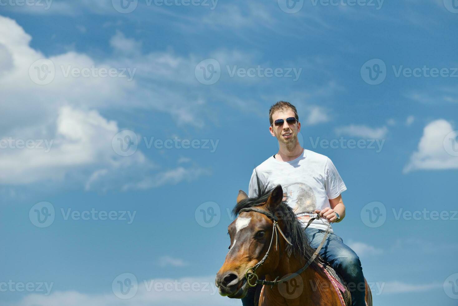 man ride horse photo