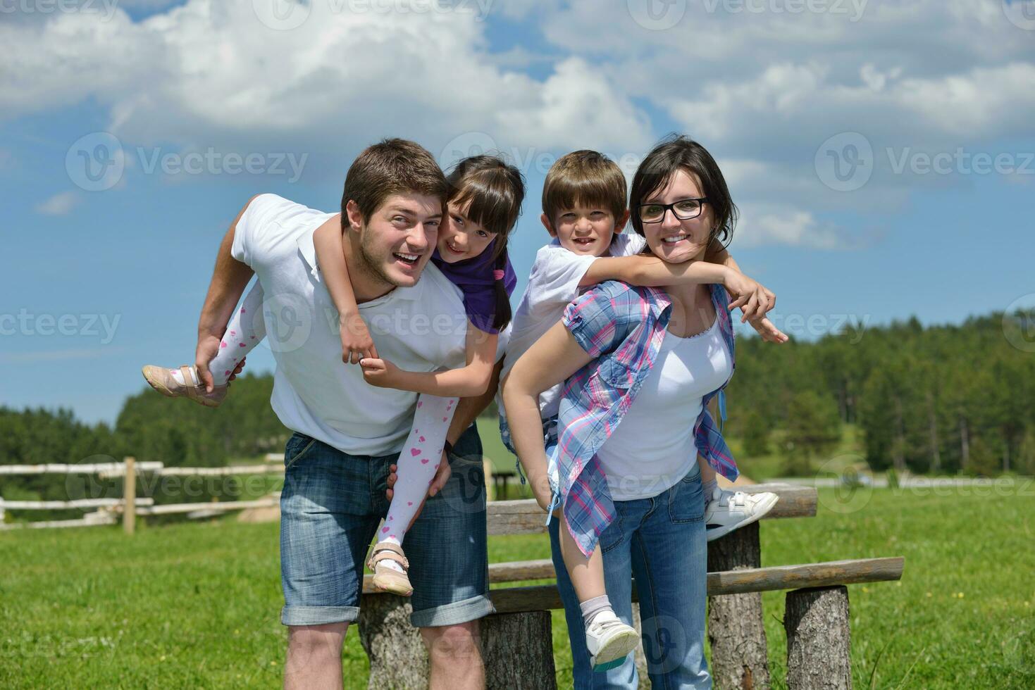 happy young family have fun outdoors photo