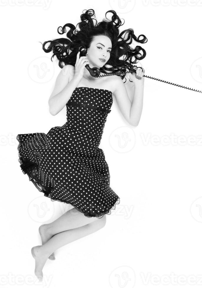 pretty girl talking on old phone photo