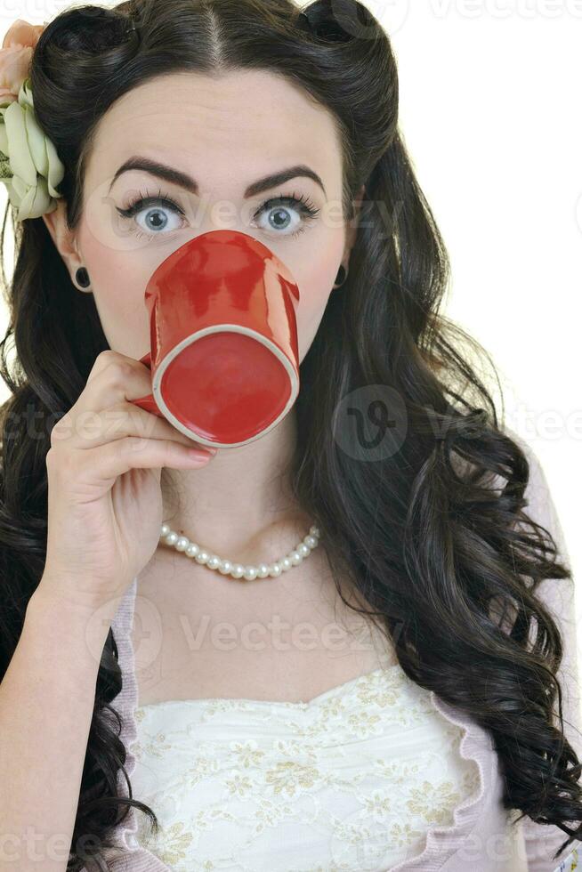 beautiful young woman with red coup of coffee isolated on white photo