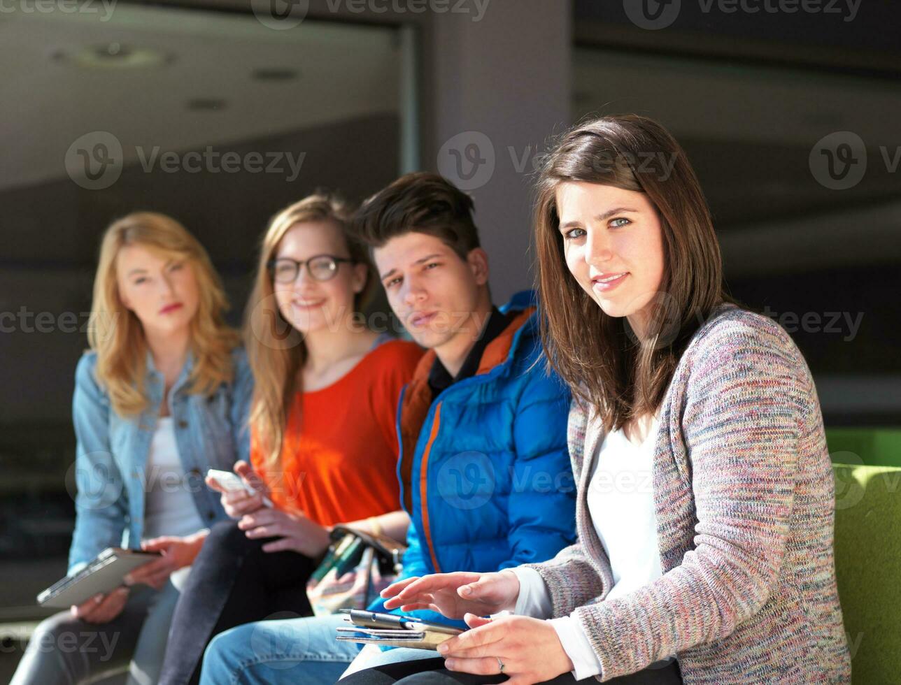 students group working on school  project  together photo