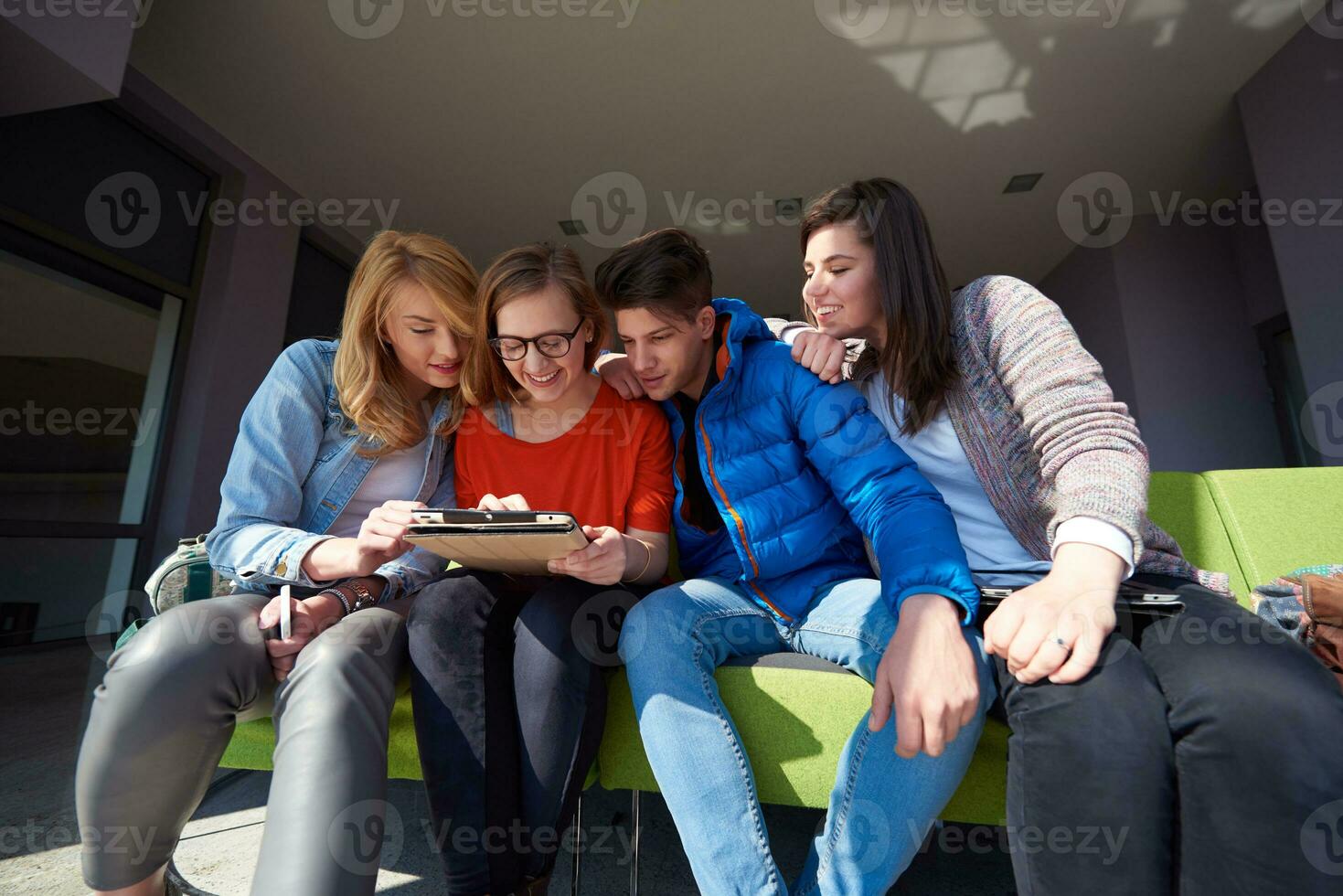 students group working on school  project  together photo