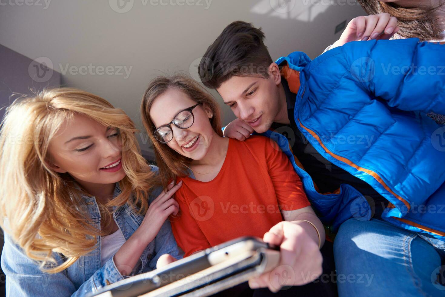 students group working on school  project  together photo