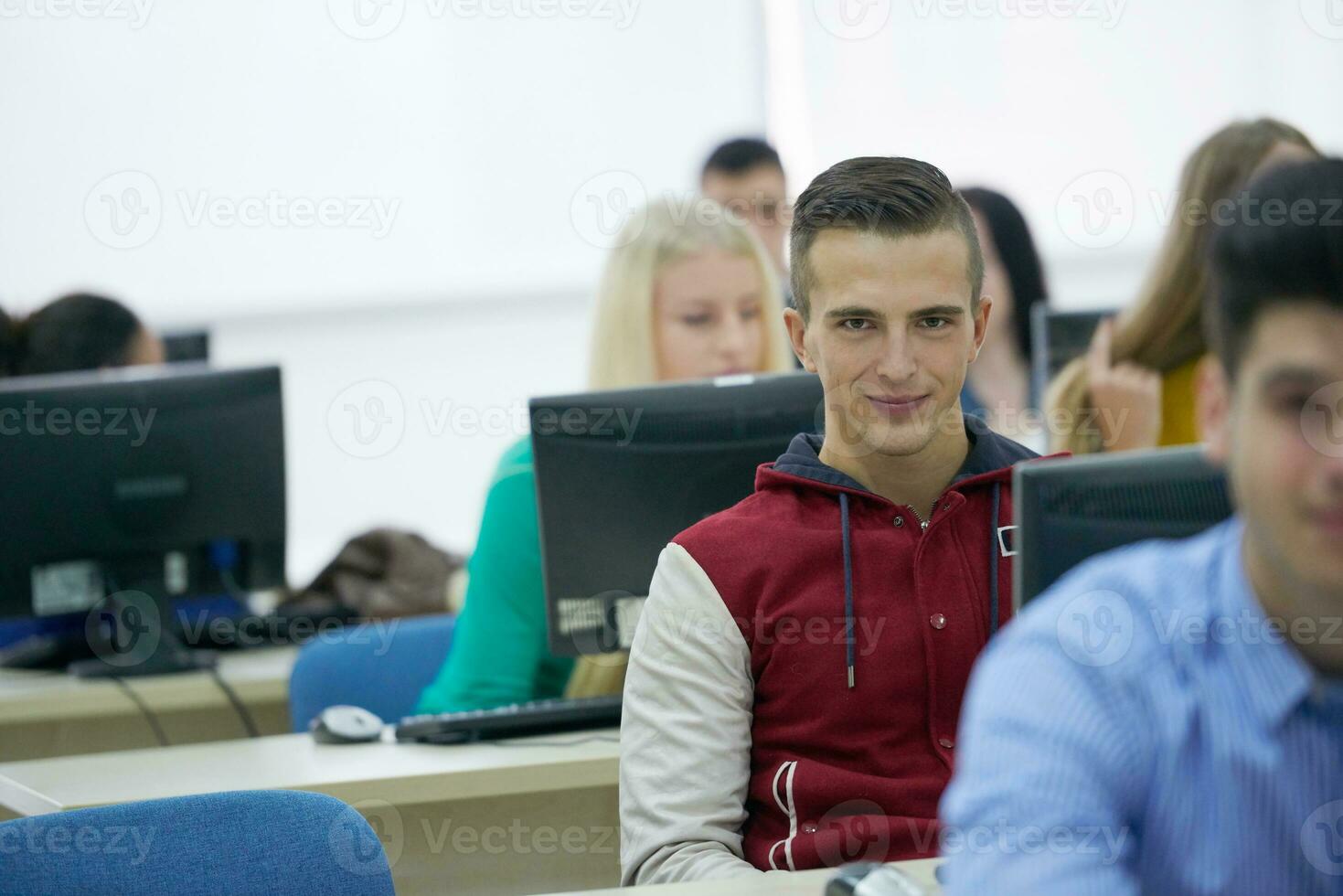 students group in computer lab classroom photo