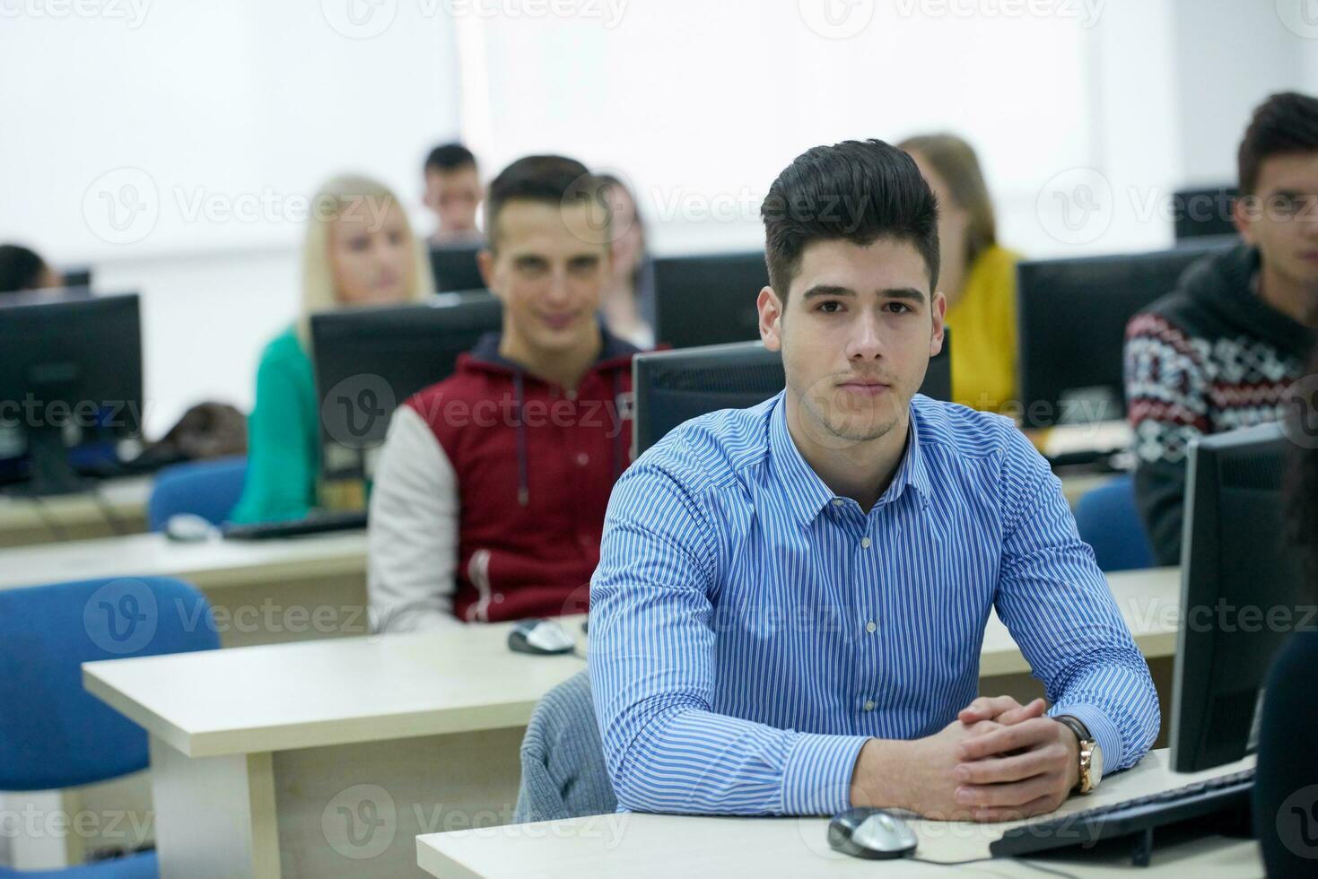 students group in computer lab classroom photo