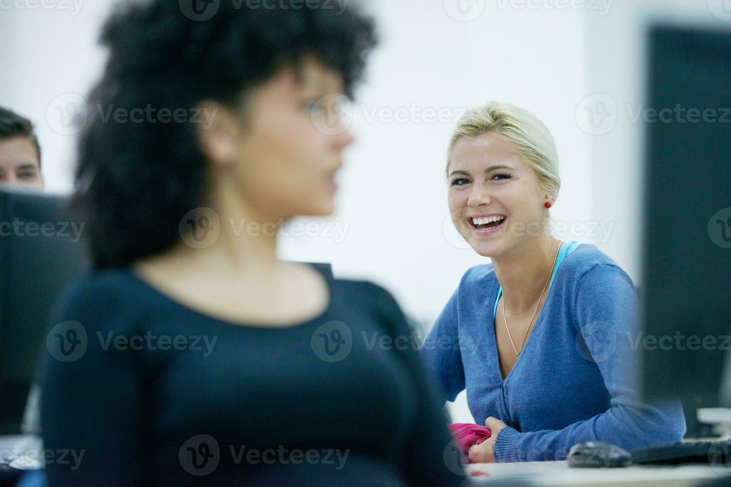 students group in computer lab classroom photo