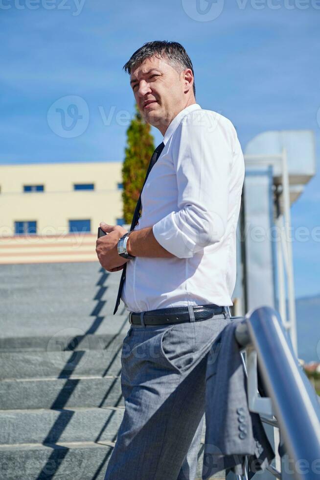 businness man portrait outdoors photo