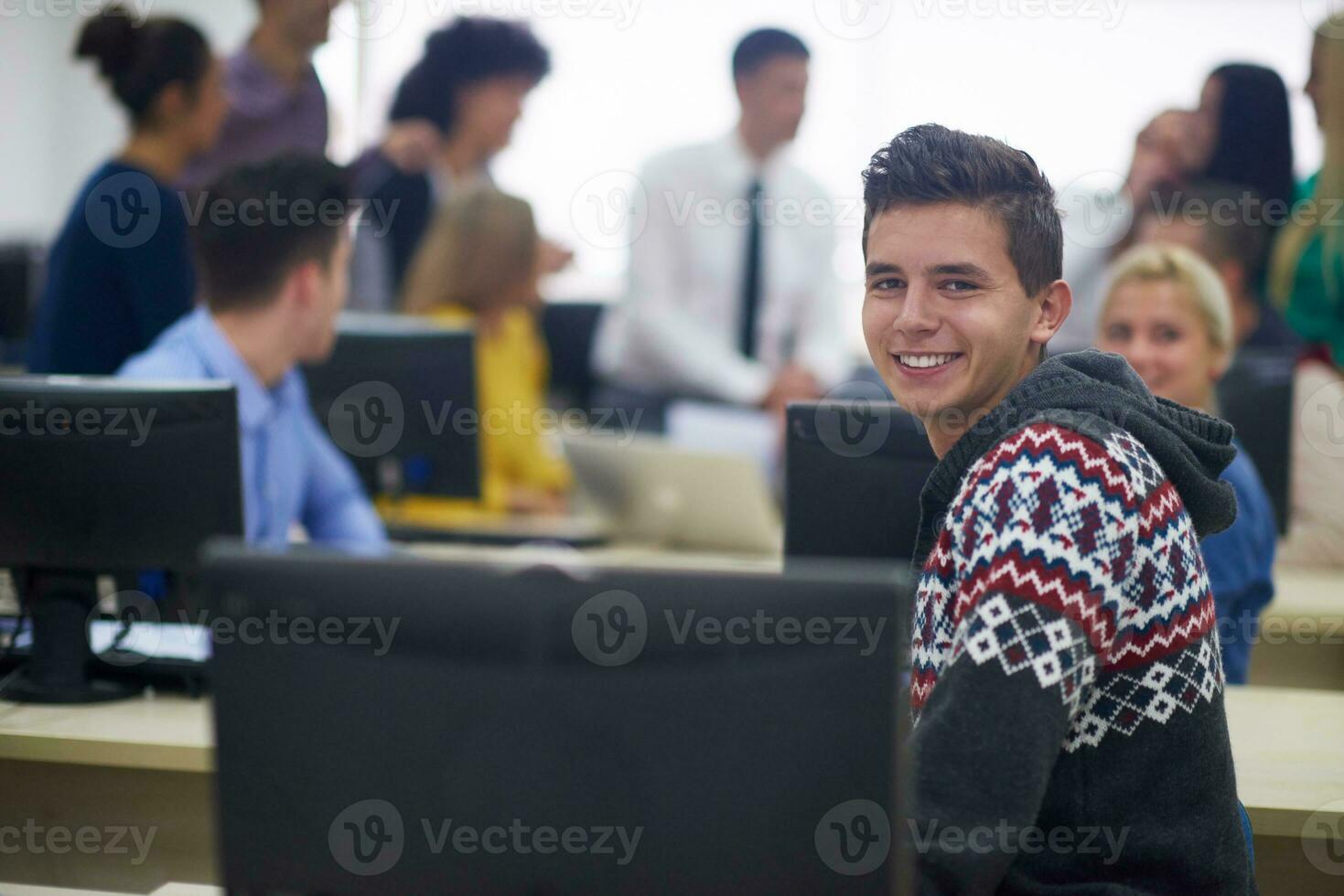 students group in computer lab classroom photo
