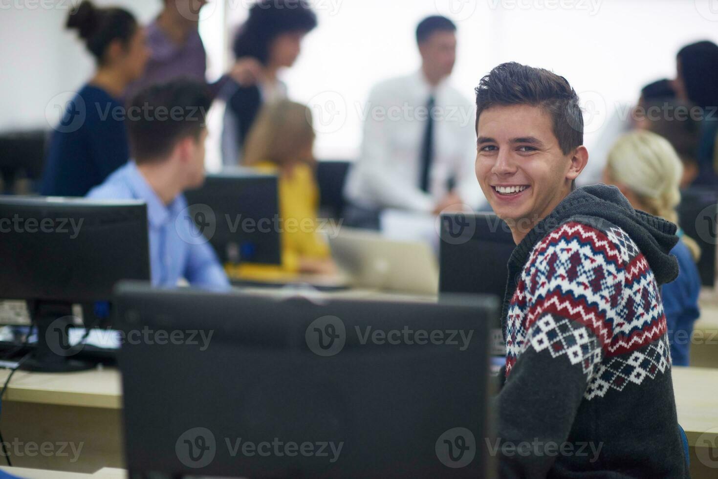 students group in computer lab classroom photo