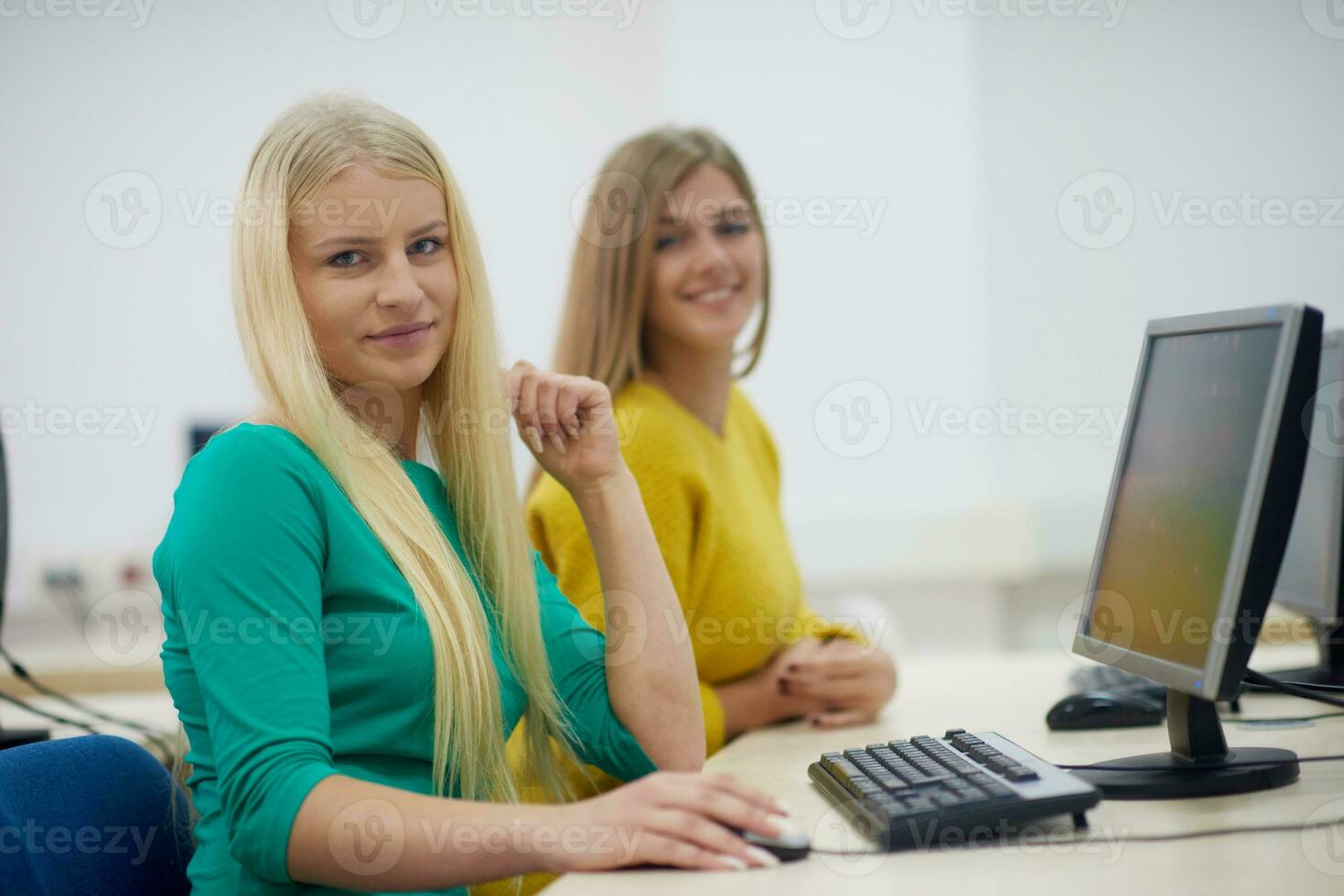 students group in computer lab classroom photo