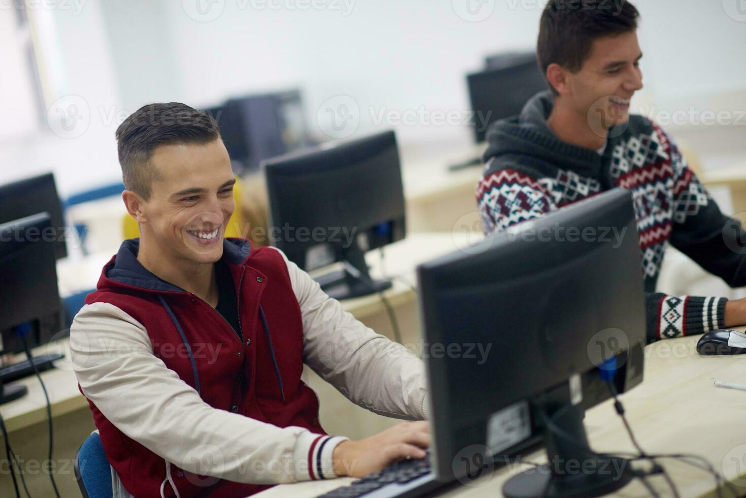 students group in computer lab classroom photo