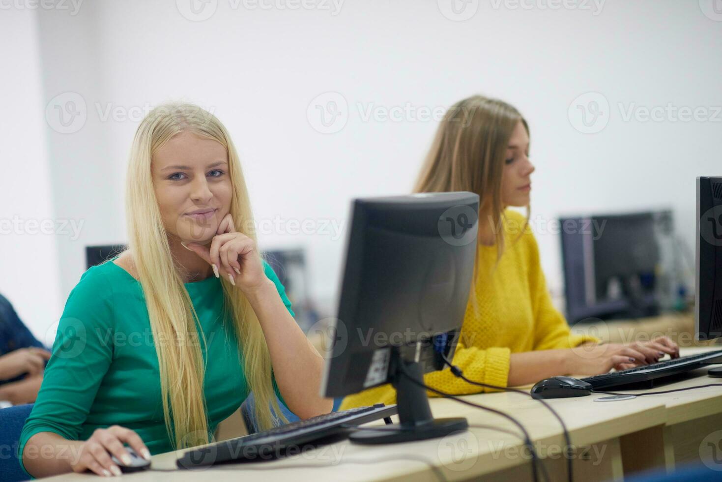 students group in computer lab classroom photo