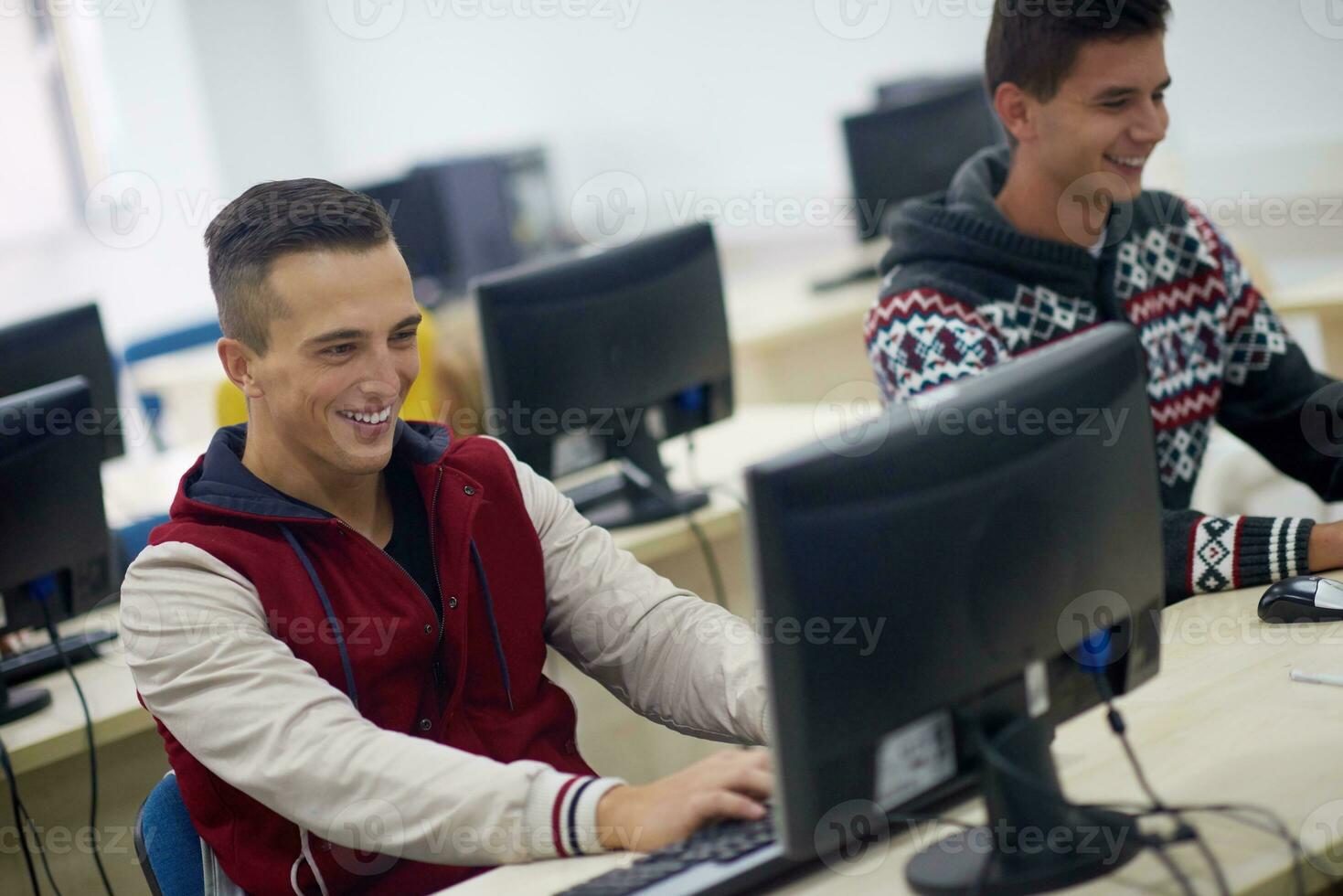 students group in computer lab classroom photo