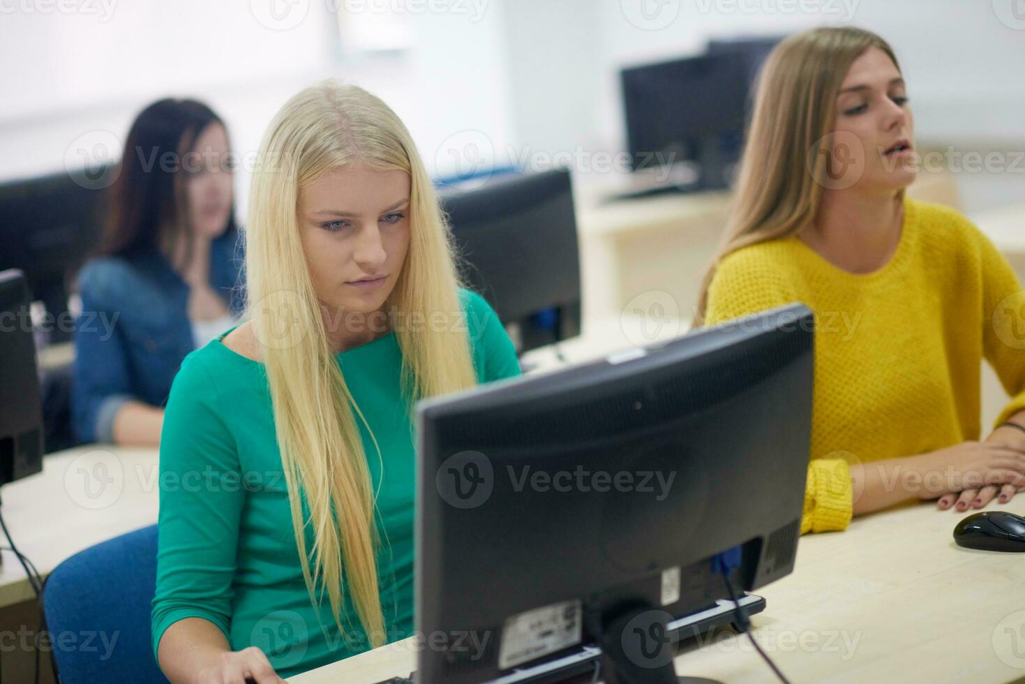students group in computer lab classroom photo