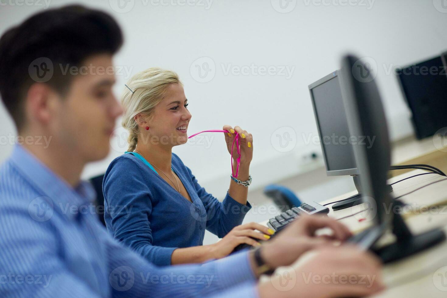 students group in computer lab classroom photo
