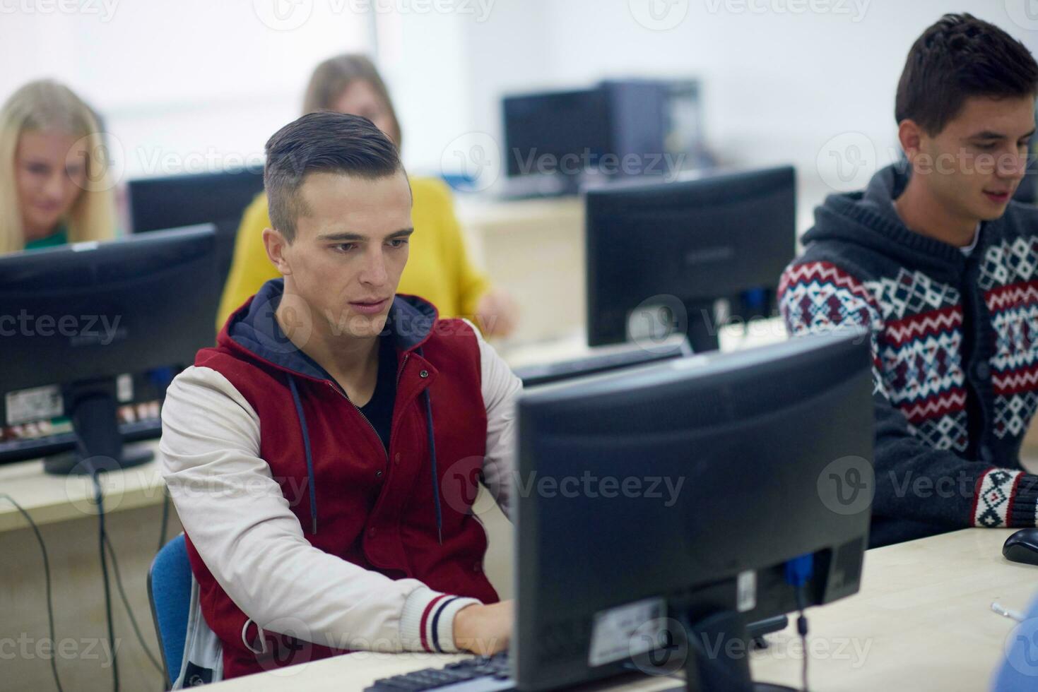 students group in computer lab classroom photo