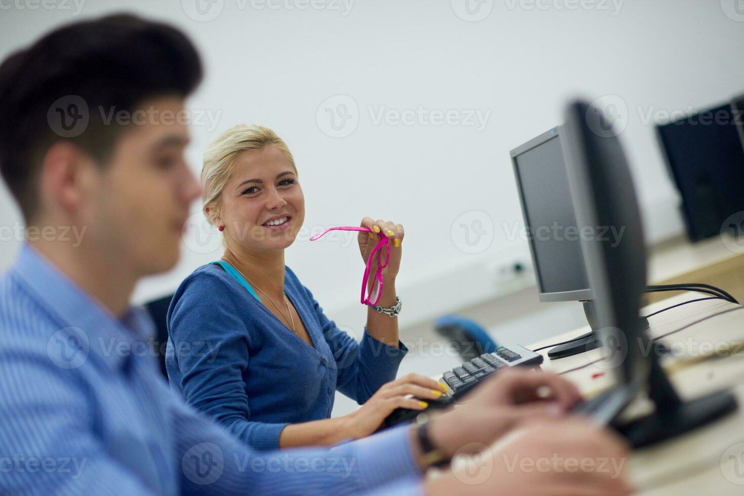 students group in computer lab classroom photo