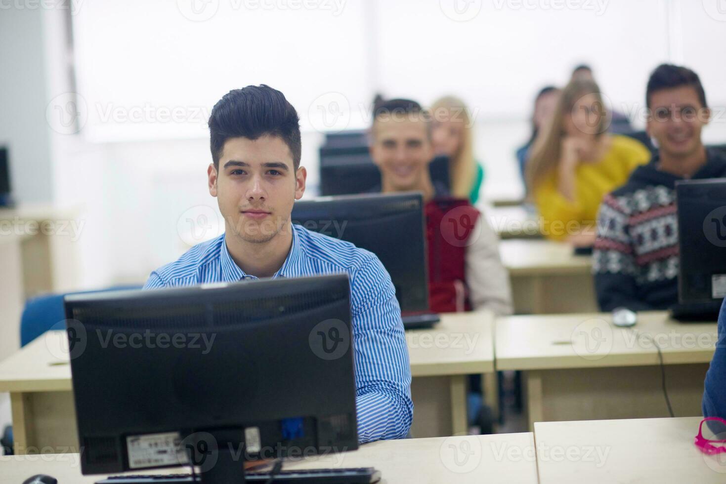 students group in computer lab classroom photo