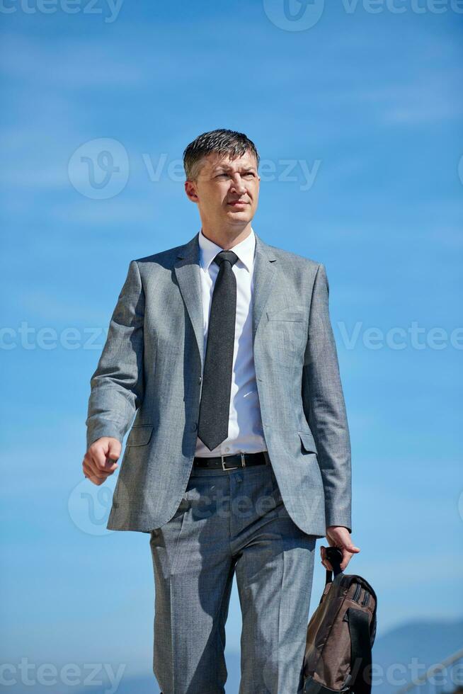 senior  businessman outdoors photo