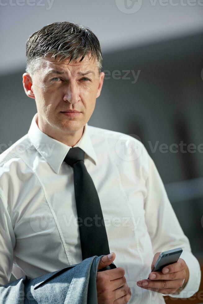 business man using phone photo