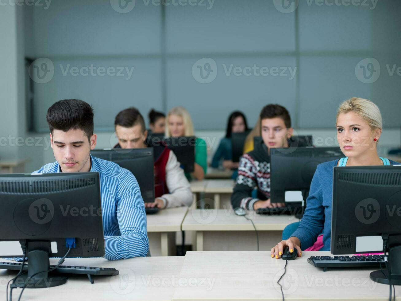 students group in computer lab classroom photo