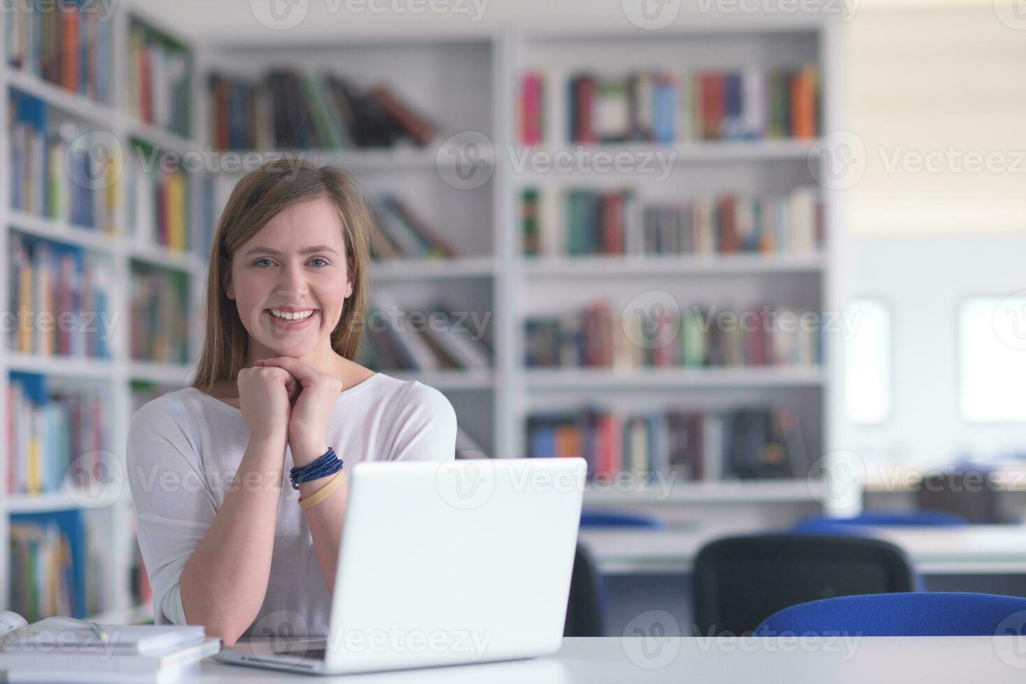 female student study in school library photo