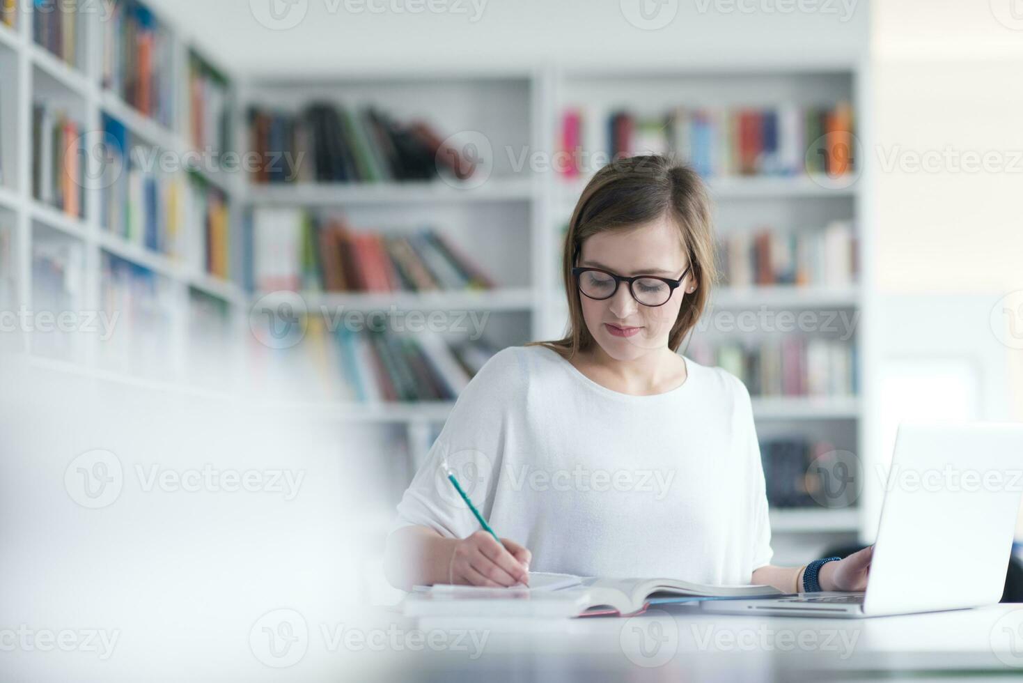 female student study in school library photo